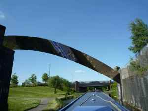 Reflective pipe bridge on the Curly Wurley - so shapely, a real feature.