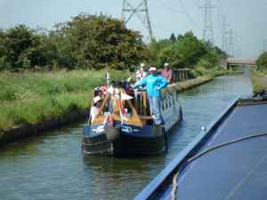 The cheery crew of nb Elemiah on the Tame Valley Canal